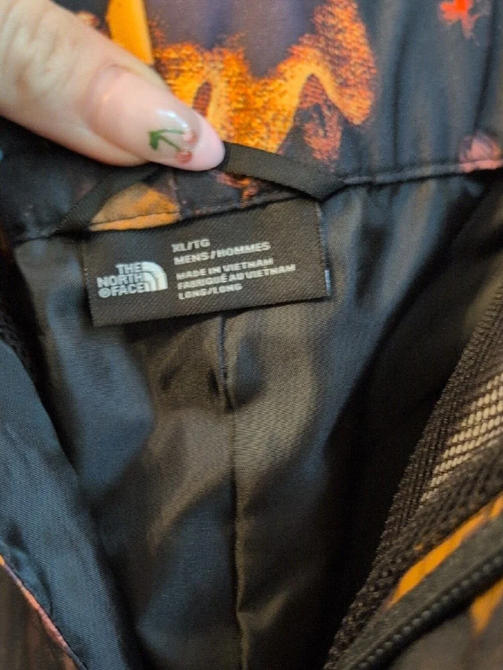 The North Face Black Floral Men's Snow Pants with Orange and Pink Accents